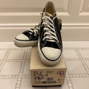 Converse All Star low black patent sneakers
